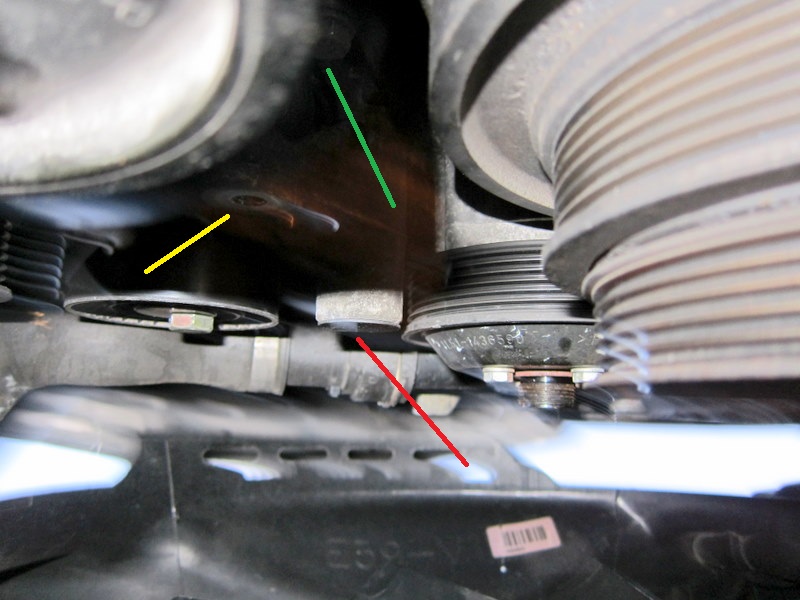 Broken main engine drive belt tensioner lug.