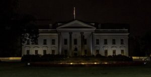 The White House at night, with the lights turned off.